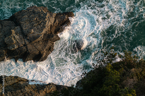 Rough wave and texture of Taejongdae rock cliff in Busan, Korea photo