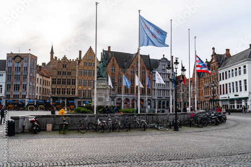 The Grote Markt, the Provinciaal Hof gothic building, and Historium building in Bruges, Belgium photo