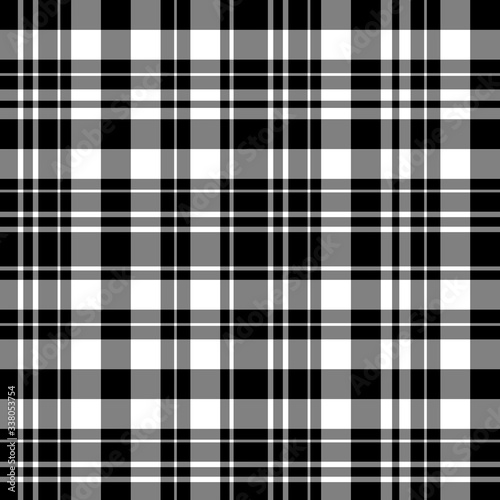 Seamless pattern in interesting black and white colors for plaid, fabric, textile, clothes, tablecloth and other things. Vector image.