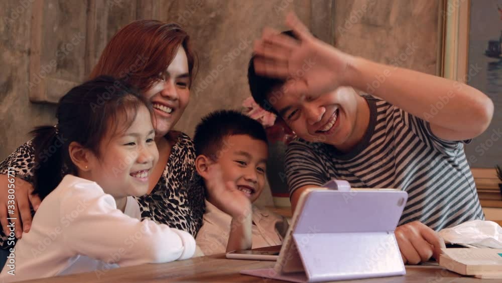 asian family quarantine at home video call to other friend