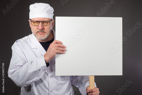 Doctor with a banner in his...