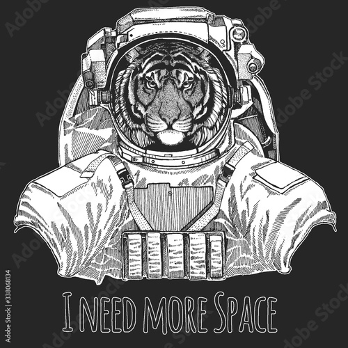 Tiger portrait. Wild cat head. Wild animal wearing space suit.
