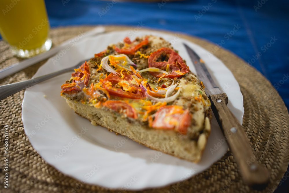 slice of pizza on plate