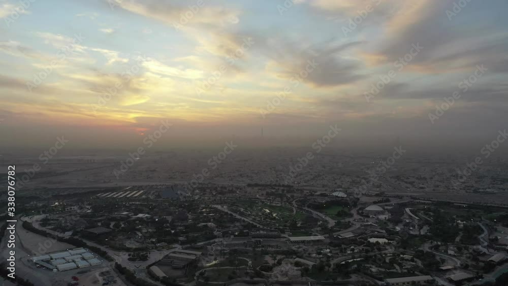 Aerial sunset shot of Dubai Skyline from the desert Aerial sunset shot of Dubai Skyline from the desert