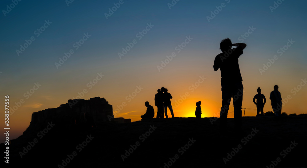 Silhouette of tourists at Mehrangarh fort in Jodhpur Silhouette of tourists at Mehrangarh fort in Jodhpur