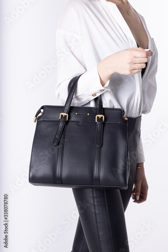  Model girl with leather elegant women bag. Fashionable female handbag, isolated
