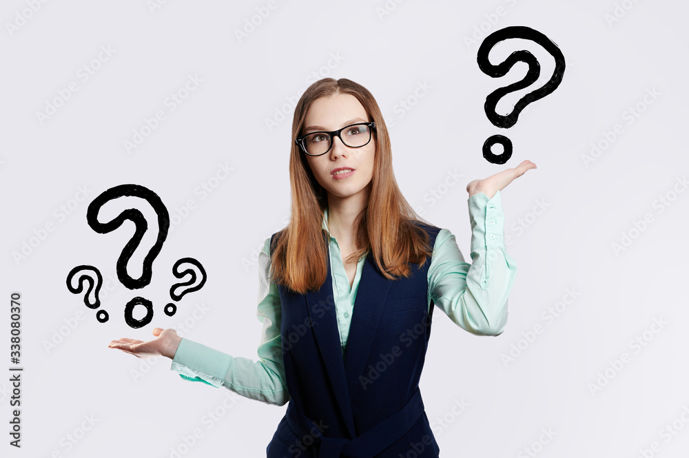 the businesswoman, question marks, the businesswoman, question marks,