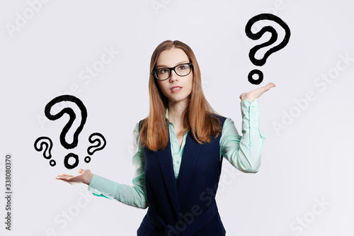 the businesswoman, question marks,