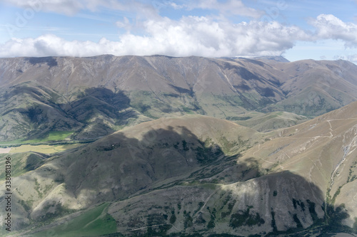 barren slopes of Dromedary hill range, near Lindis Pass, New Zealand