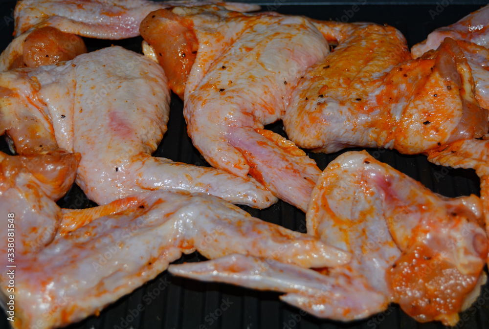 Homemade food grilled chicken wings in sauce Homemade food grilled chicken wings in sauce