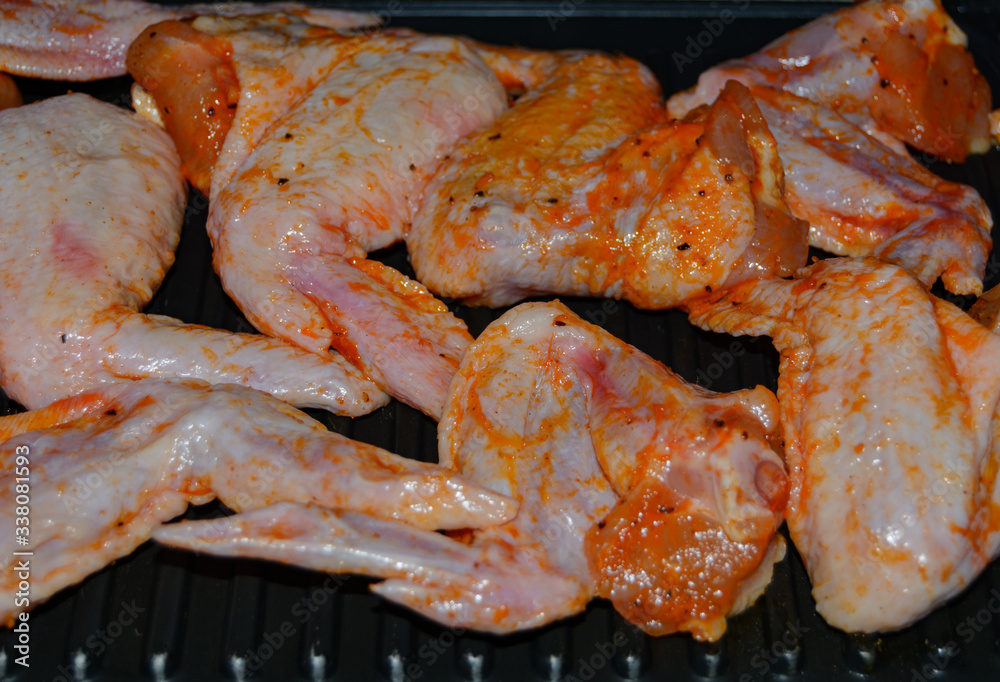 Homemade food grilled chicken wings in sauce Homemade food grilled chicken wings in sauce
