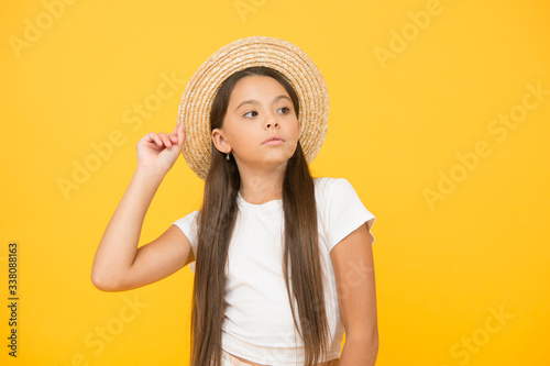Teen girl summer fashion. Little beauty in straw hat. She deserve good rest. Summer camp for kids. Beach style for kids. Travel wardrobe. Panama hat will be useful this summer. Summer vacation outfit
