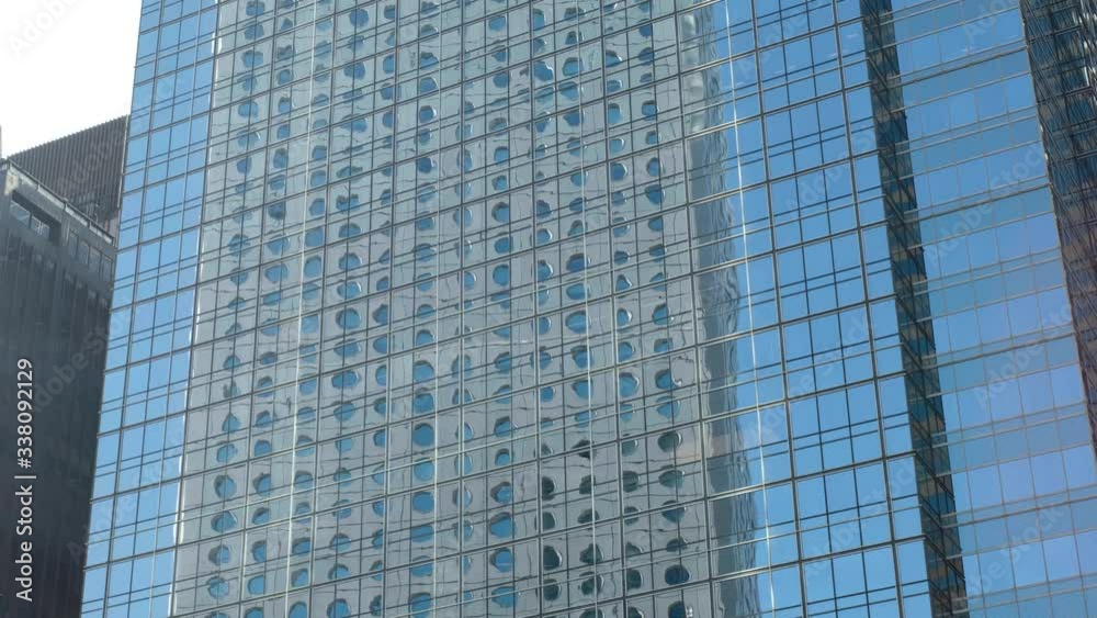 glass facade of modern office building skyscraper glass facade of modern office building skyscraper