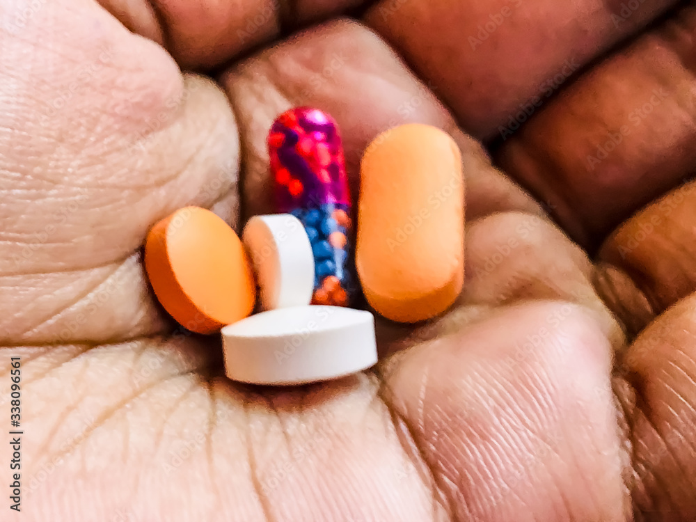 pills in hand pills in hand