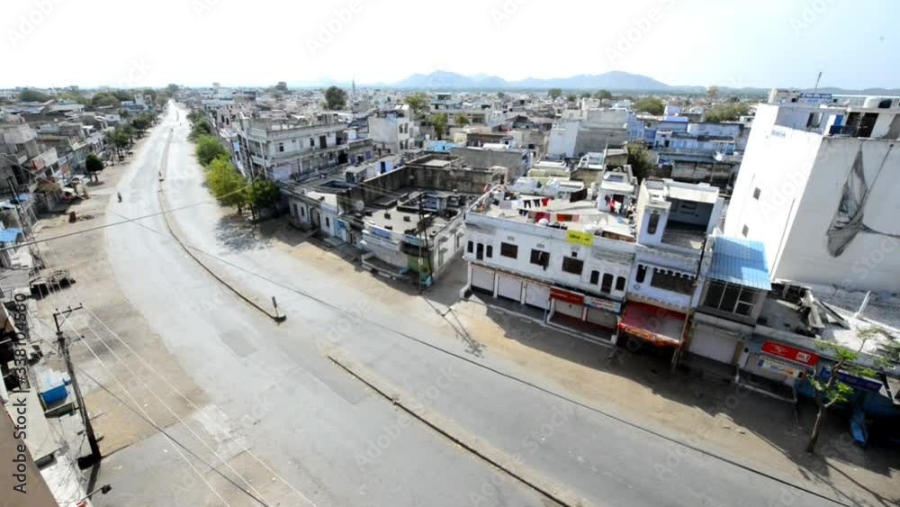 Aerial view of a usually busy street is deserted during Nationwide Lockdown in the wake of Coronavirus pandemic, at Beawar in the Indian state of Rajasthan. Aerial view of a usually busy street is deserted during Nationwide Lockdown in the wake of Coronavirus pandemic, at Beawar in the Indian state of Rajasthan.