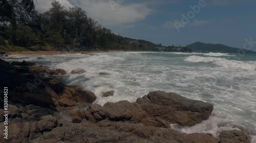 View of the stormy sea and rocky shore