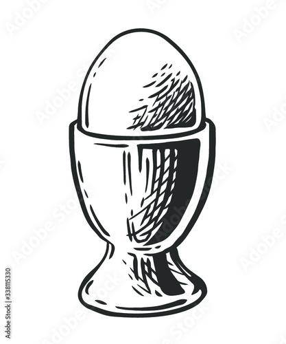 Egg on a stand isolated on white background. Vector hand drawn vintage engraving illustration for poster, label and menu shop