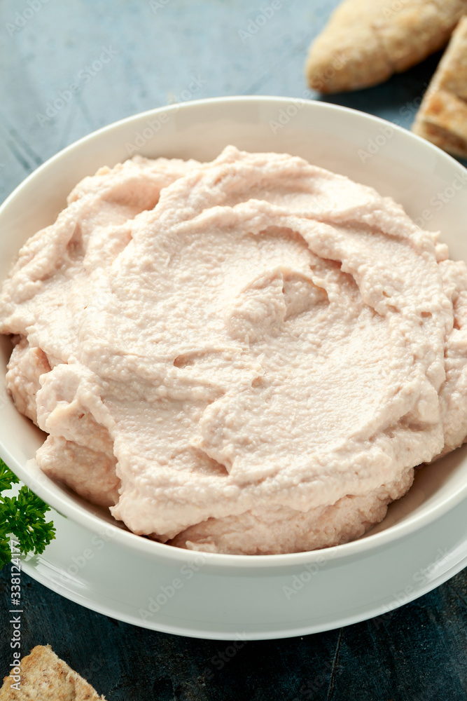 Taramasalata dip made with fish roe in white bowl Taramasalata dip made with fish roe in white bowl