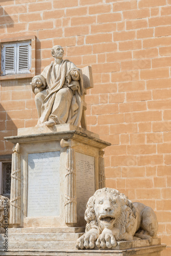 Malta / Malta 03.09.2015. Joseph Nicolai Zammit, Maltese doctor and philosopher, monument with lions, Upper Barracca Garden, Valletta, Malta photo