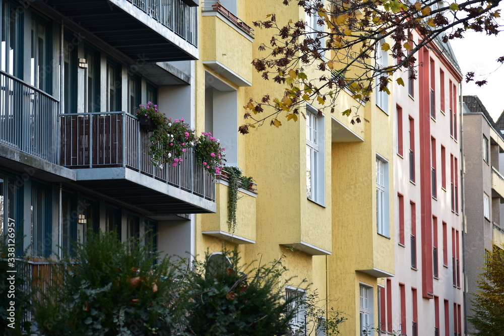 Fototapeta premium blue yellow and red apartment buildings in Steglitz Berlin Germany