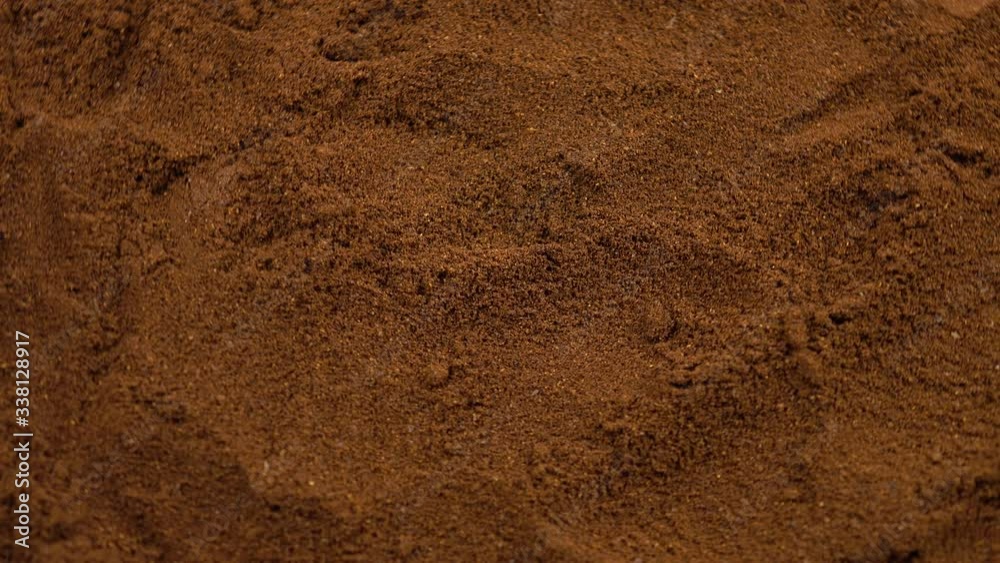 Surface of the ground coffee beans, background Surface of the ground coffee beans, background