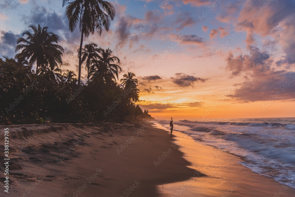 sunset on a tropical beach - obrazy, fototapety, plakaty 