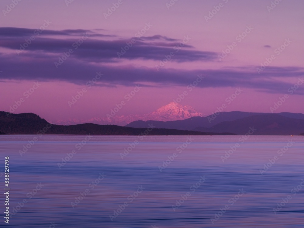 Mt. Baker glows during Pink Supermoon rise, seen from Sidney BC shore