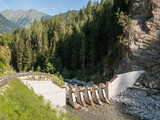Mudflow protection barrier in a mountain stream in the Alps, in Pfunds, Tyrol, Austria