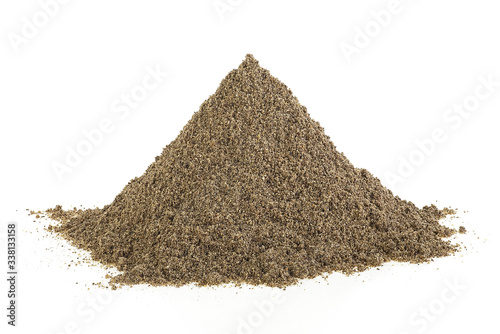 Ground black pepper isolated on a white background