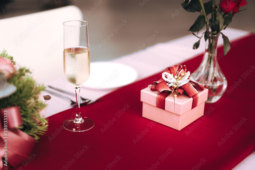 Valentine date dinner table with gift box