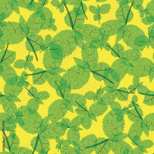 Green mint leaves on a yellow background seamless vector pattern. Herbs themed surface print design. For fabrics, stationery, scrapbook paper, and packaging. © rysunki.malunki