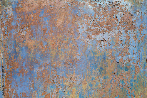 Painted metal with cracks in the paint, roughness, rust. Iron sheet covered with old paint, which has cracked from time and weather conditions. Metal background, texture, backdrop.