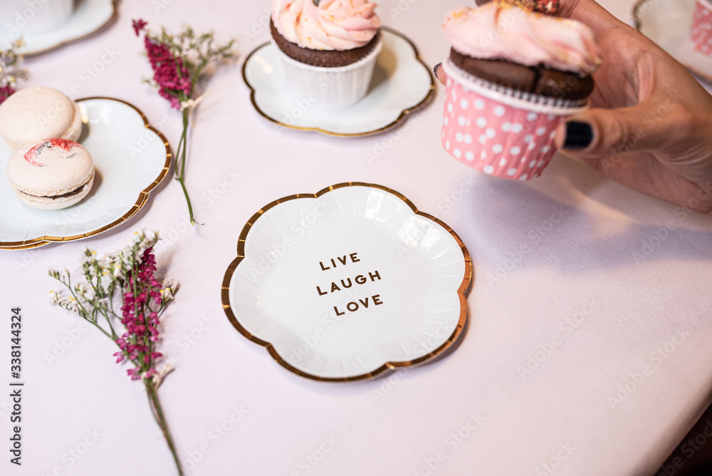 Beautiful table set for an event party or wedding reception . restaurant interior cakes on table Beautiful table set for an event party or wedding reception . restaurant interior cakes on table