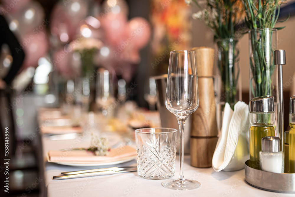 Beautiful table set for an event party or wedding reception . restaurant interior flowers Beautiful table set for an event party or wedding reception . restaurant interior flowers