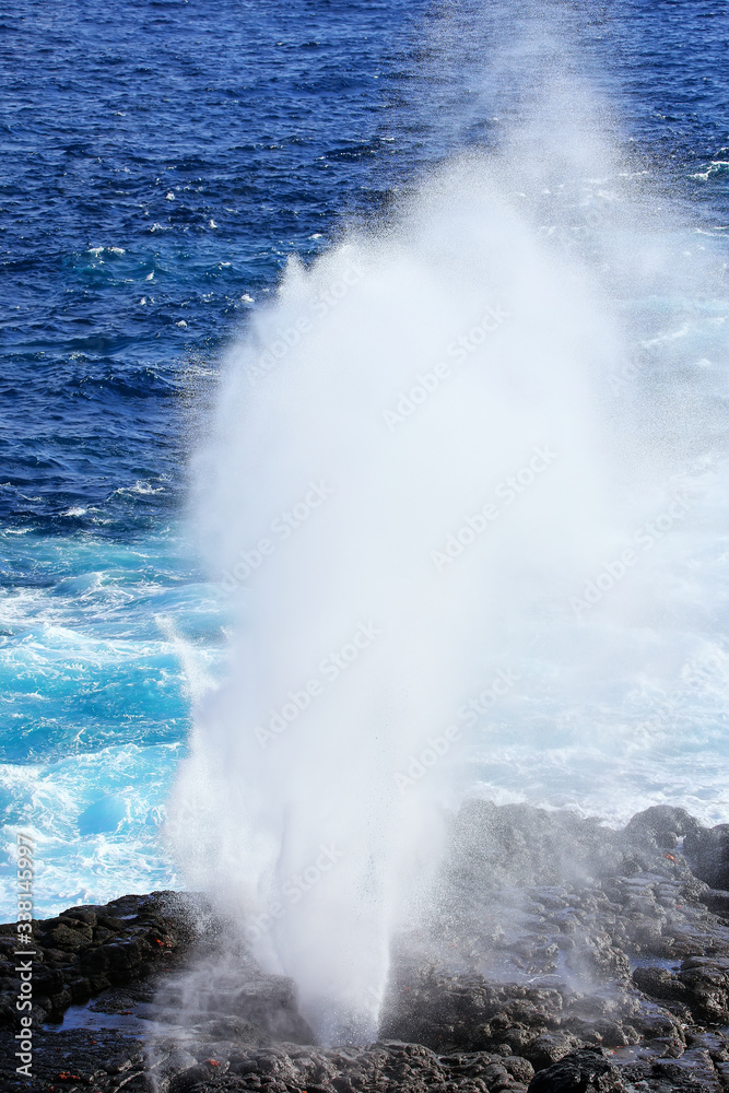 Water bursts through blowhole on Espanola Island, Galapagos National park, Ecuador. Water bursts through blowhole on Espanola Island, Galapagos National park, Ecuador.