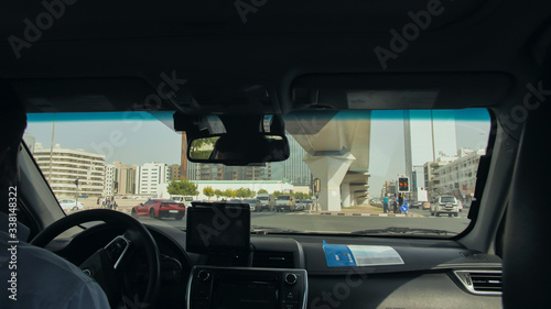 View from the cab of a car taxi to the streets of Dubai. © Довидович Михаил