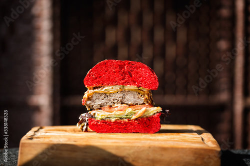 Red velvet Burger on a wooden board