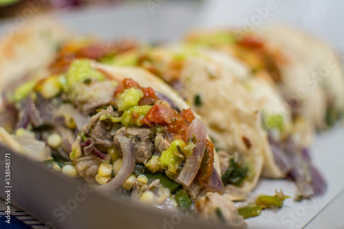 vegetable and meat tacos with guacamole