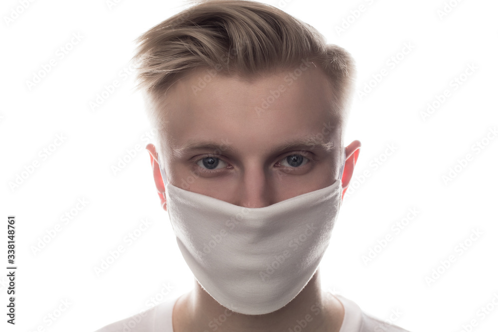 Man wearing face protective mask on face against Coronavirus isolated on white. Man wearing face protective mask on face against Coronavirus isolated on white.