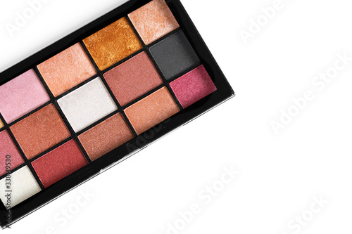 Make up colorful eyeshadow palettes on white, close up