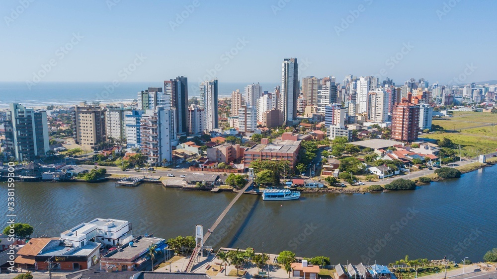 Torres - RS. Aerial view suspension bridge Mampituba river and Torres town, Rio Grande do Sul, Brazil