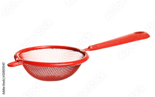 Red metal sieve isolated on white background with clipping path