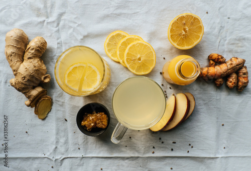 Various immune boosting citrus drinks with ginger and turmeric