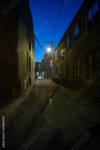 Dark and eerie urban city alley at night  © Bruno Passigatti