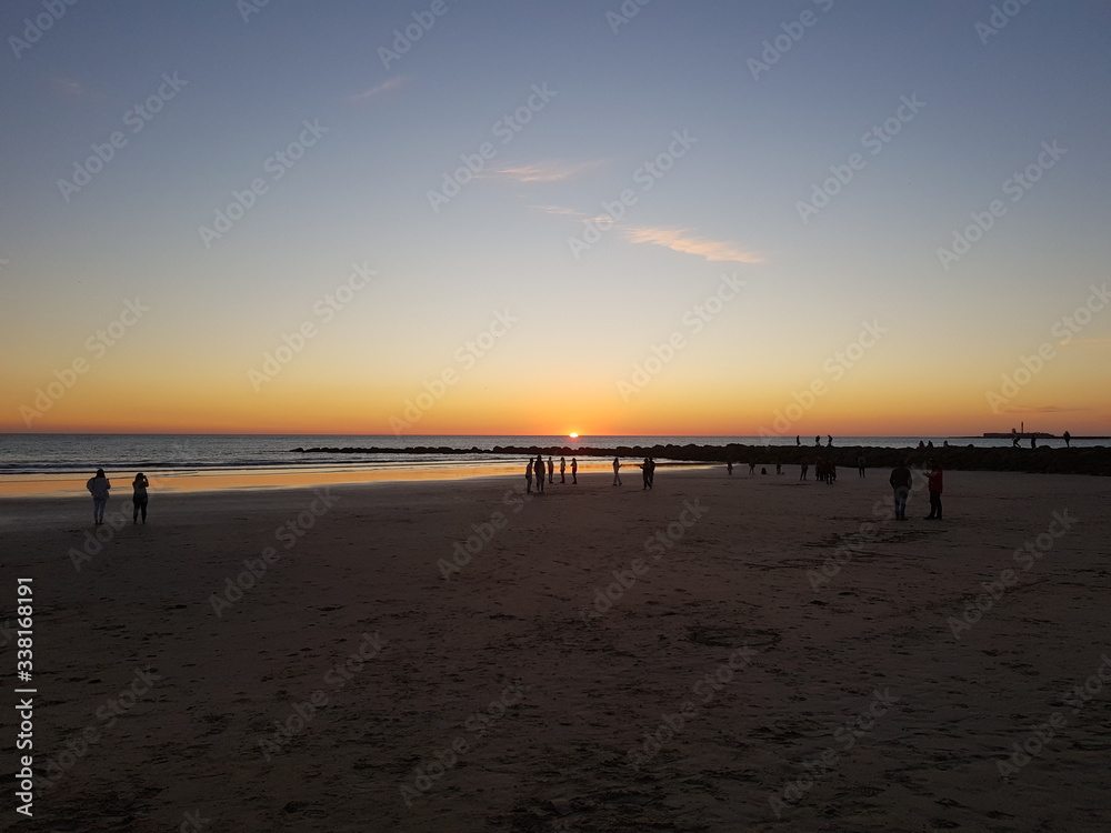 Sunset on the beach in Cadiz. 