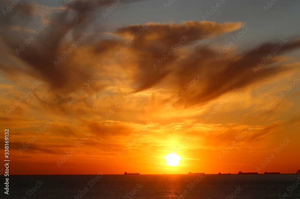Beautiful photo of a bright sunset on the sea
