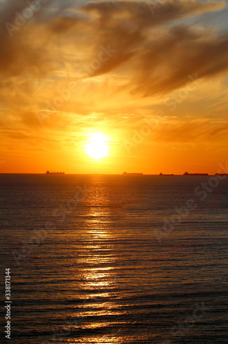 Beautiful photo of a bright sunset on the sea © tanor27