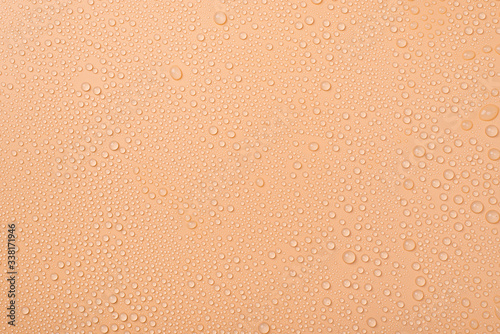 Top above overhead view photo of little drops of water on beige background