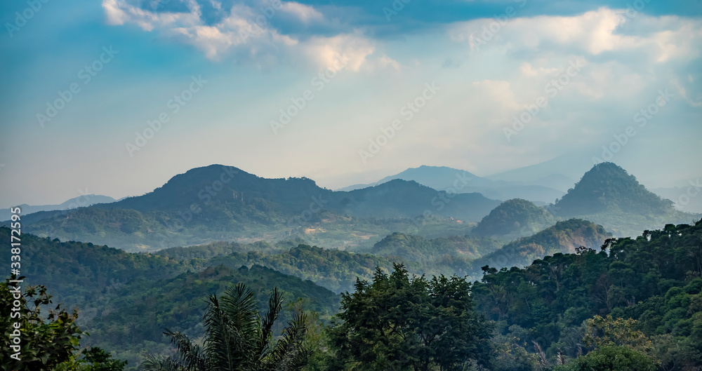 Beautiful hills covered in haze because of forest fires spotted in rural West Java, Indonesia