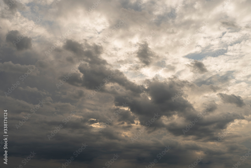 Obraz premium sunset sky with dense clouds. Texture concept.